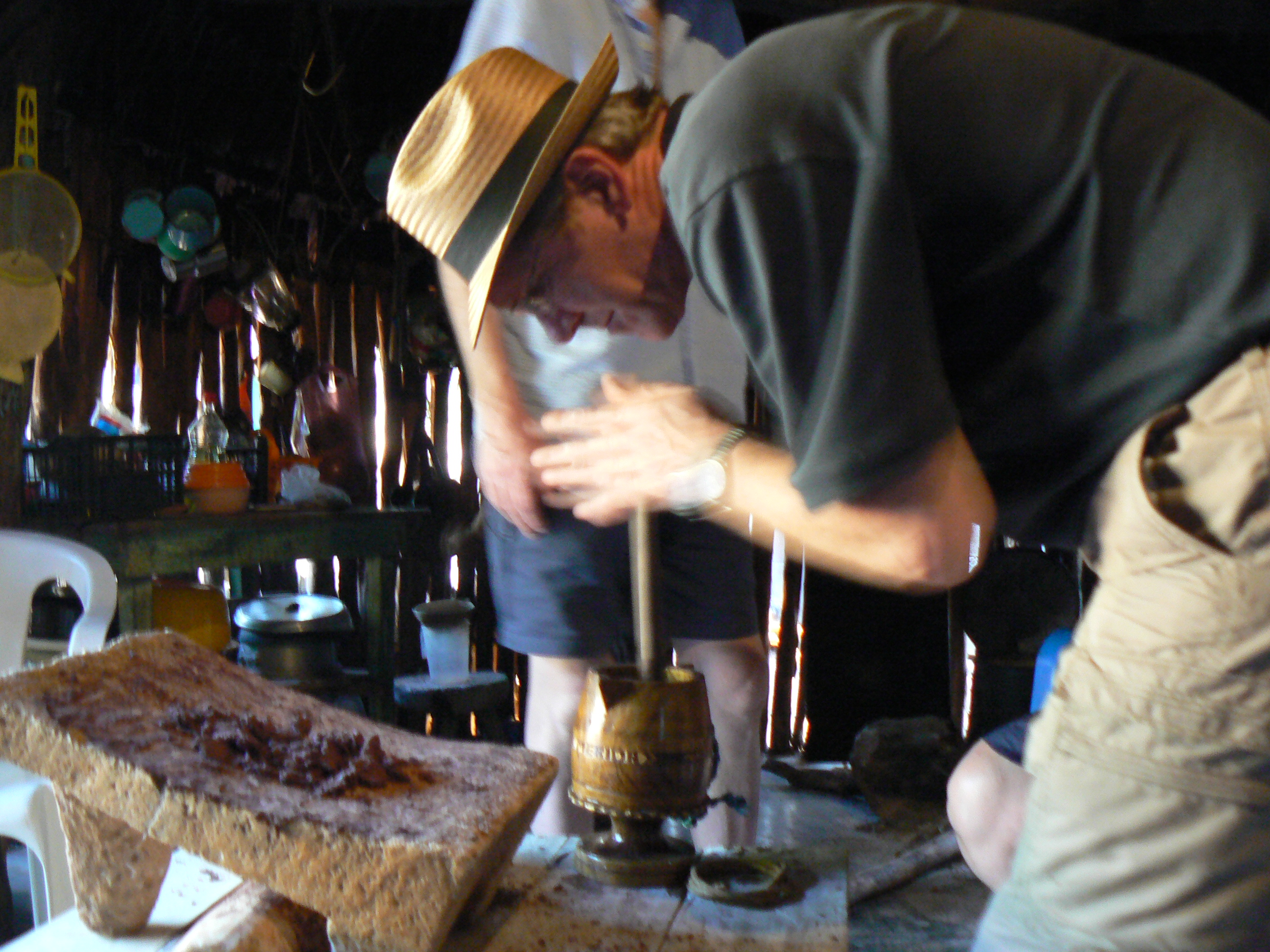 making cocoa in the tradtional Mayan way.